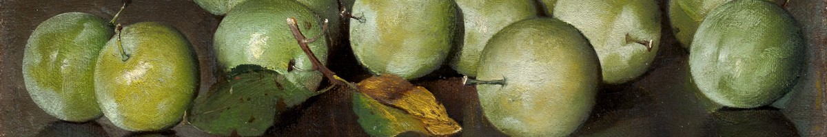 Several green plums on a brown table